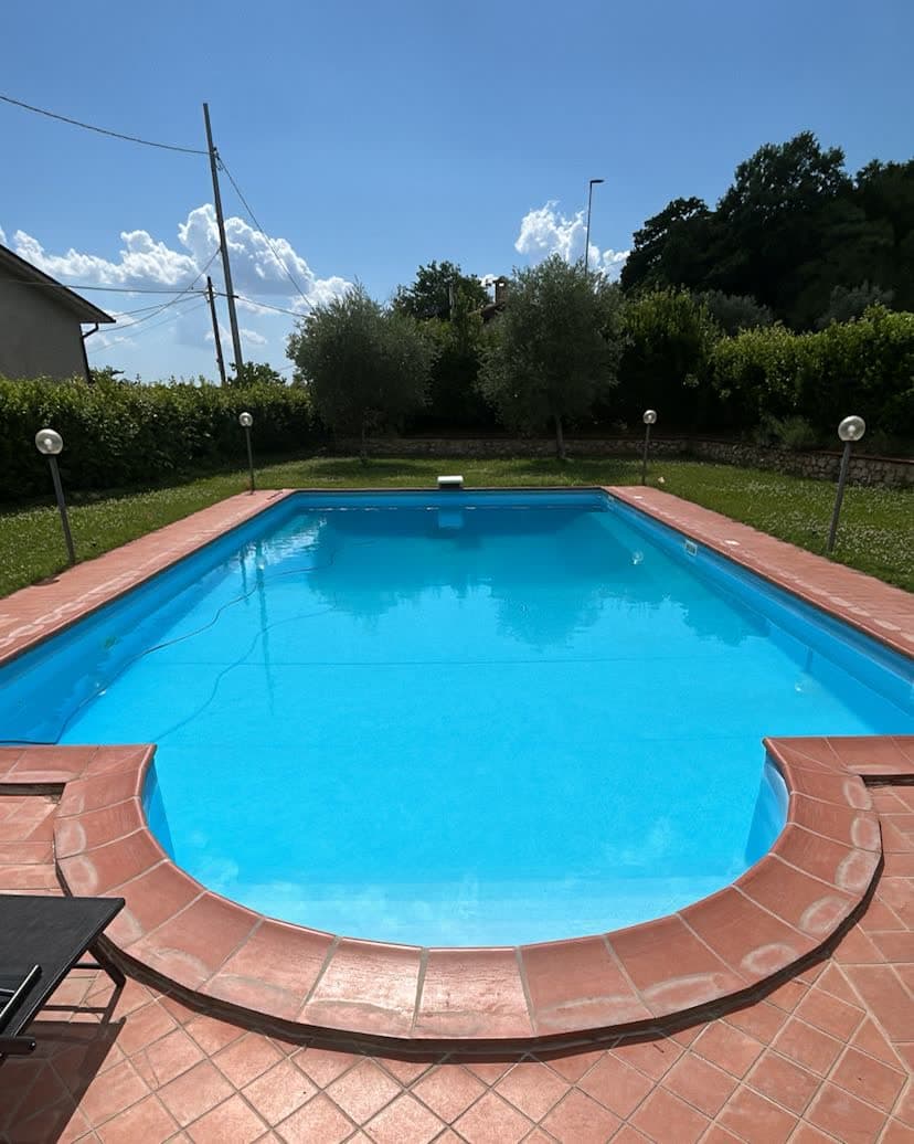 The pool seen from above on a sunny day